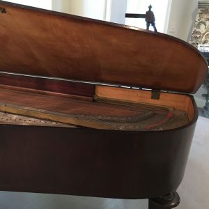 grand piano with lid lifted